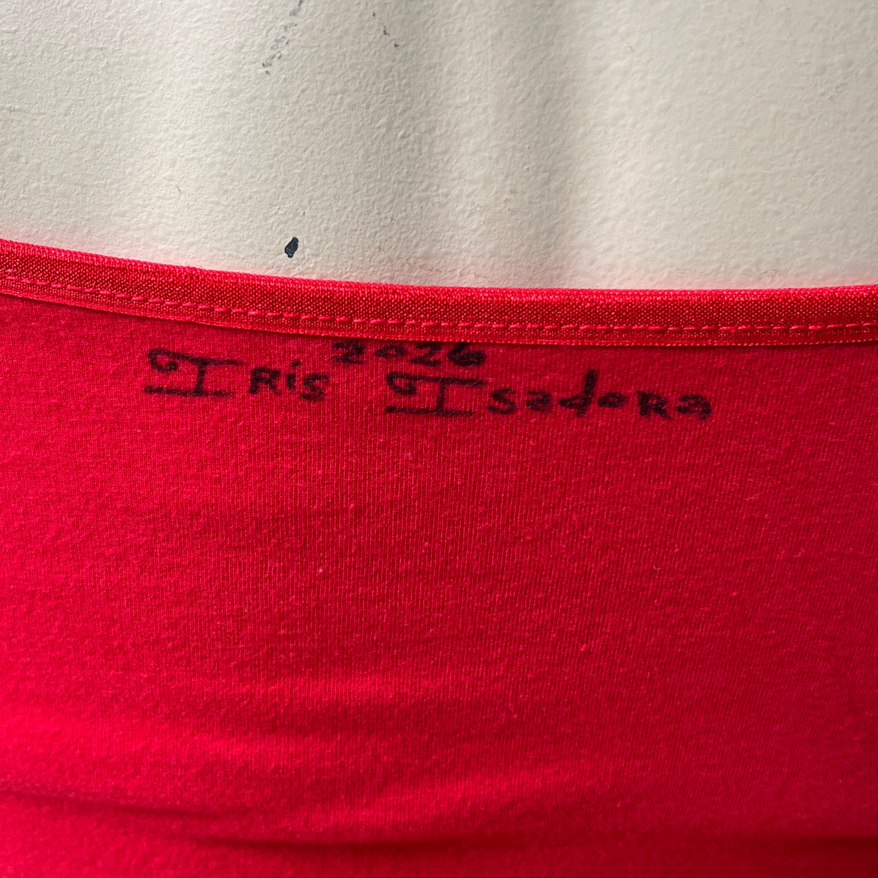 Doll Features Red Tank